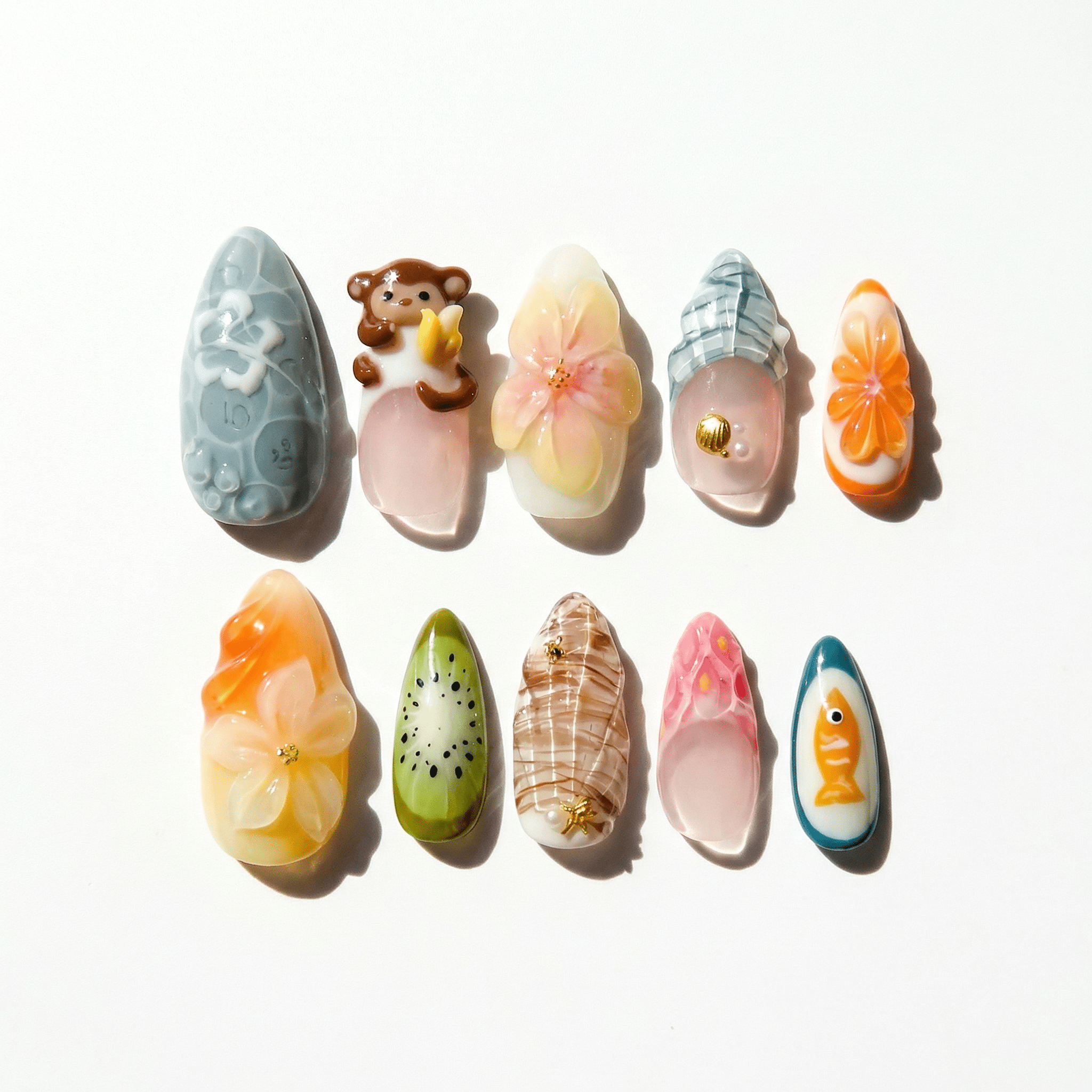 Tropical Monkey press-on nails – hand-painted reusable gel set by Handora