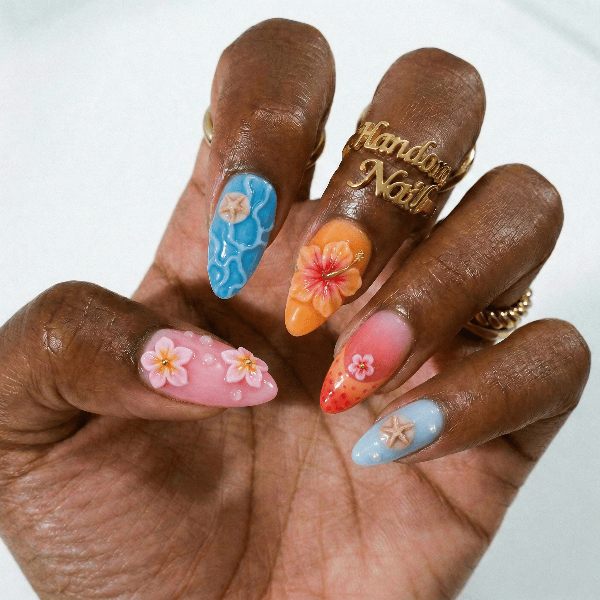 Tropical Shell press-on nails – hand-painted reusable gel set by Handora