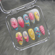 Tropical Summer press-on nails worn on hand – almond shape by Handora