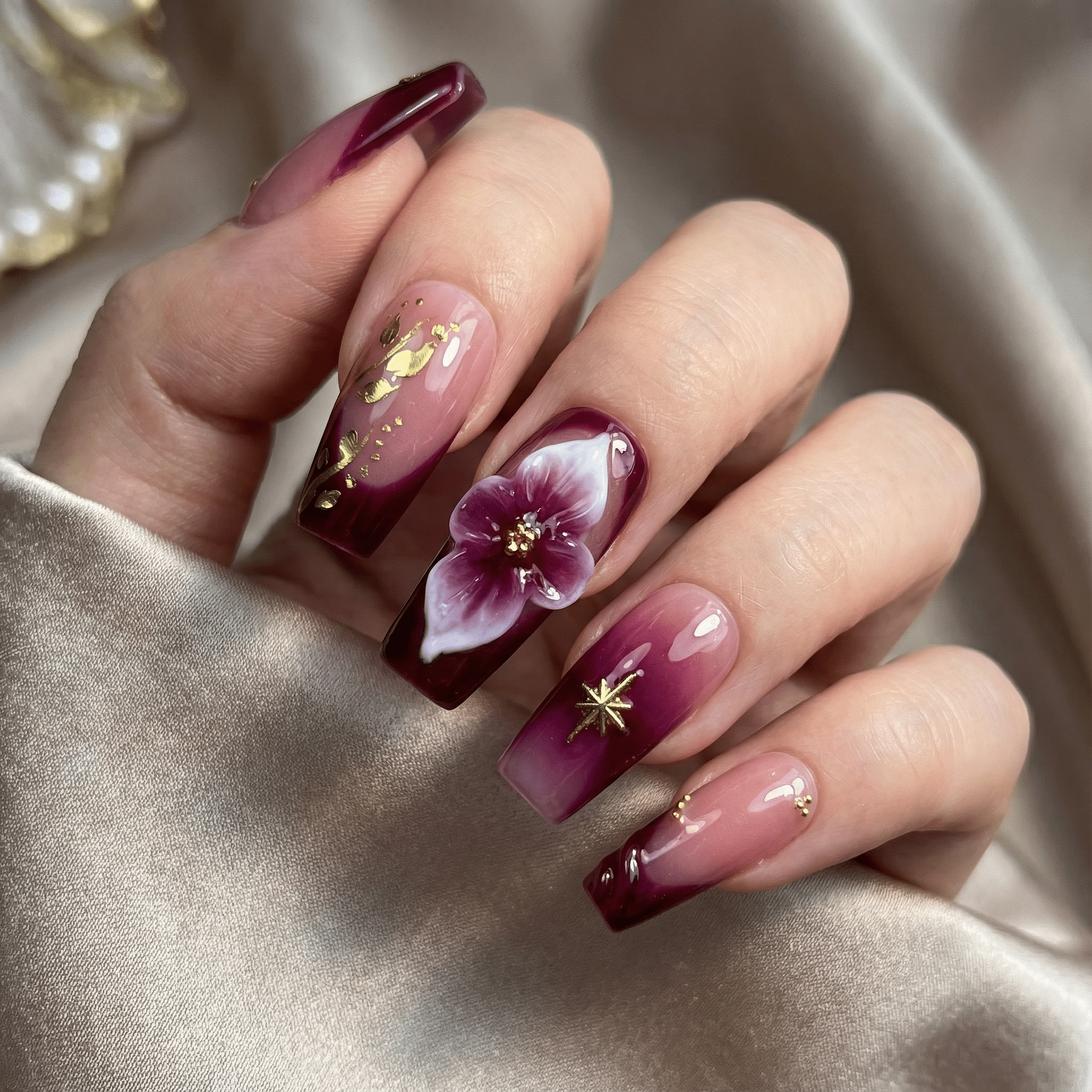 Velvet Aura press-on nails worn on hand – coffin shape by Handora