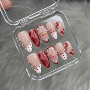 Velvet Petal almond press-on nails – design close-up by Handora