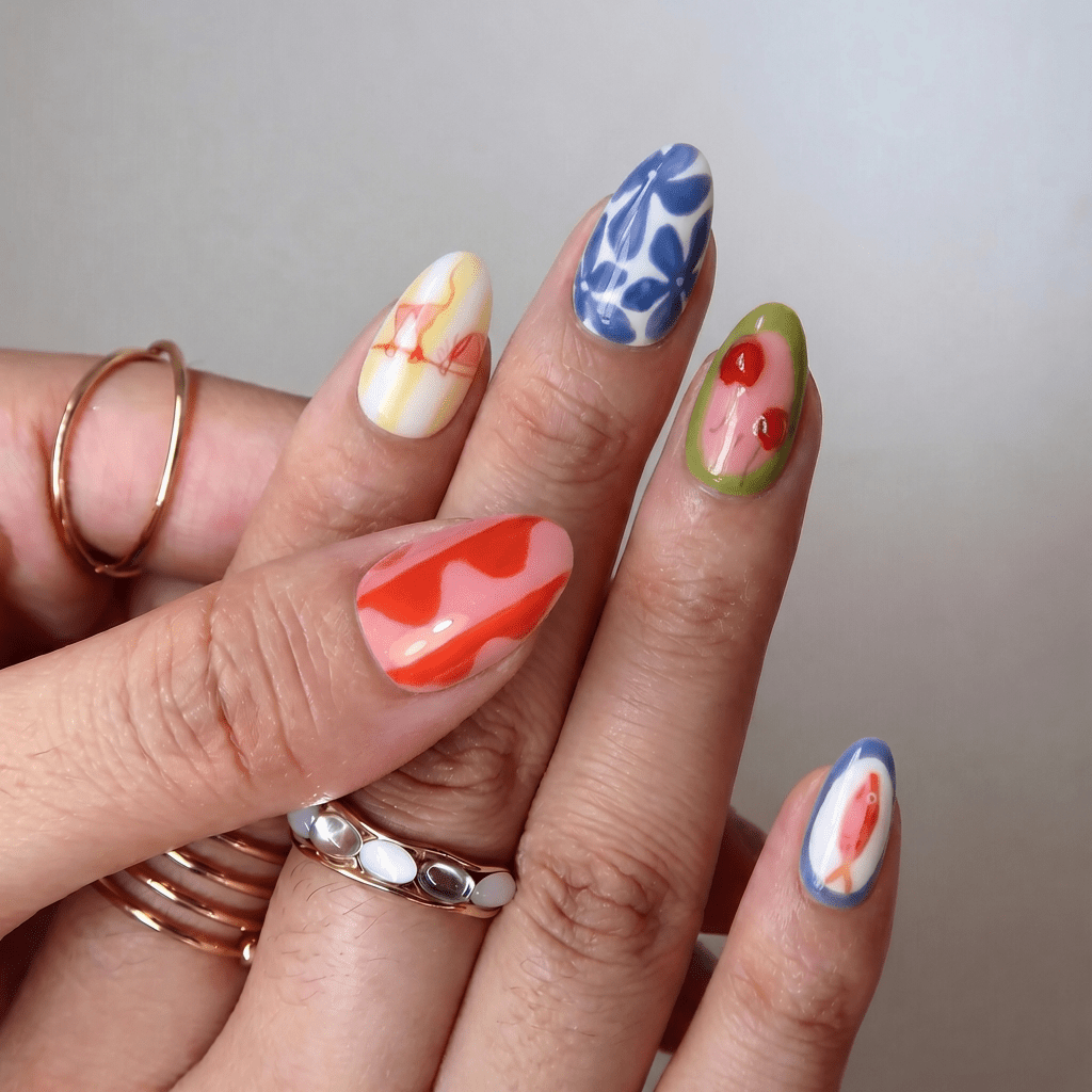 Vibrant Summer press-on nails worn on hand – almond shape by Handora