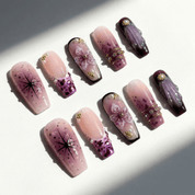 Violet Dream press-on nails worn on hand – coffin shape by Handora