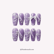 Violet Ribbon purple cat eye press-on nails by Handora