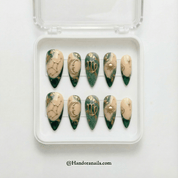 Virgo Essence press-on nails worn on hand – almond shape by Handora