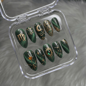 Virgo Luxe press-on nails worn on hand – almond shape by Handora