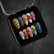 Vivid Liquid almond press-on nails – design close-up by Handora