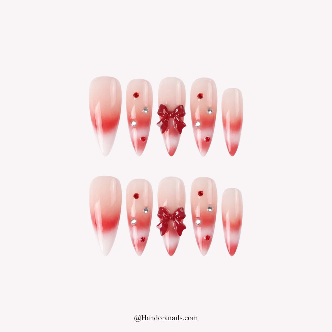 Woolen Bow Christmas press-on nails – full set on white background by Handora Nails