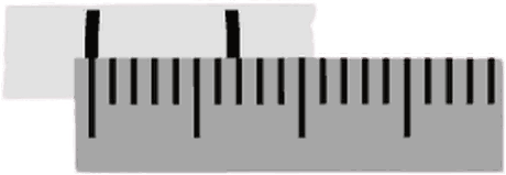 The marked strip laid flat against a ruler, showing the gap between the two marks